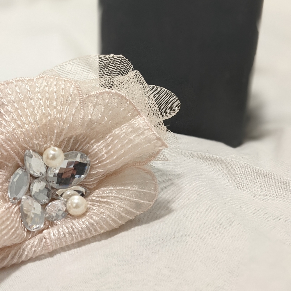 Head band with bejeweled chiffon flower